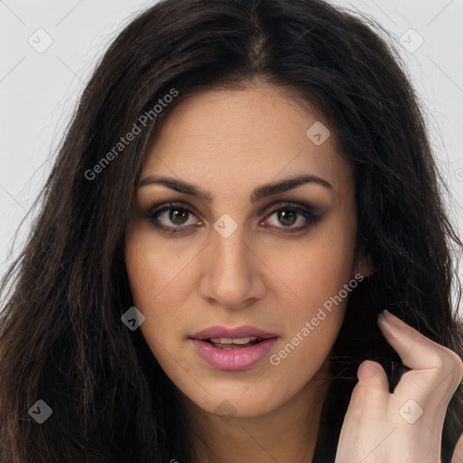 Joyful latino young-adult female with long  brown hair and brown eyes