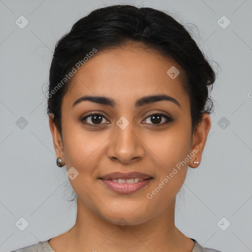 Joyful latino young-adult female with medium  brown hair and brown eyes