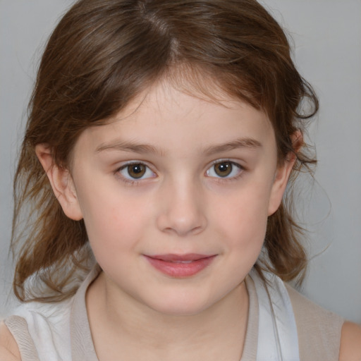 Joyful white child female with medium  brown hair and brown eyes