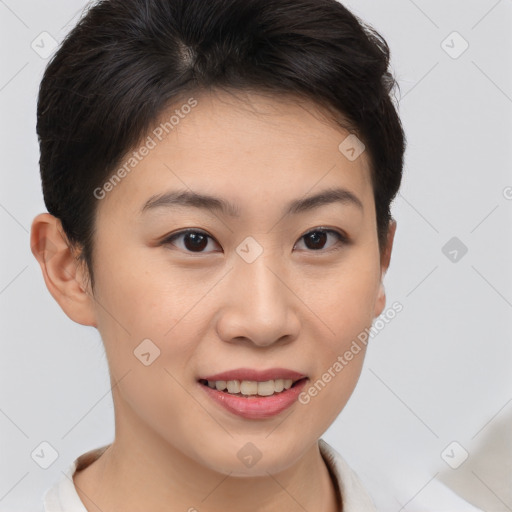 Joyful asian young-adult female with short  brown hair and brown eyes