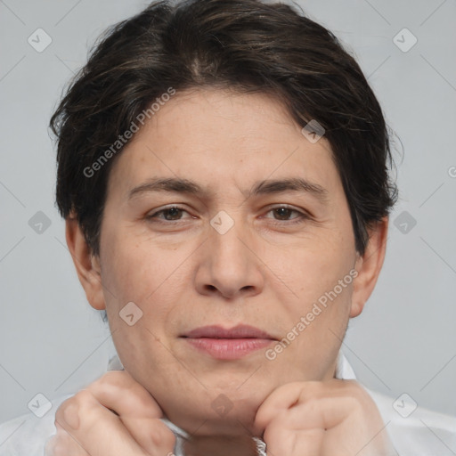 Joyful white adult female with short  brown hair and brown eyes