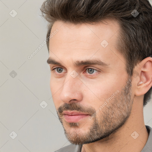 Neutral white young-adult male with short  brown hair and brown eyes