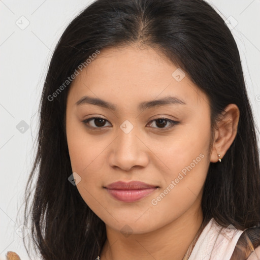 Joyful latino young-adult female with long  brown hair and brown eyes