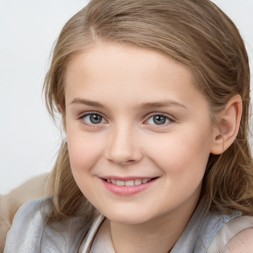 Joyful white child female with medium  brown hair and blue eyes