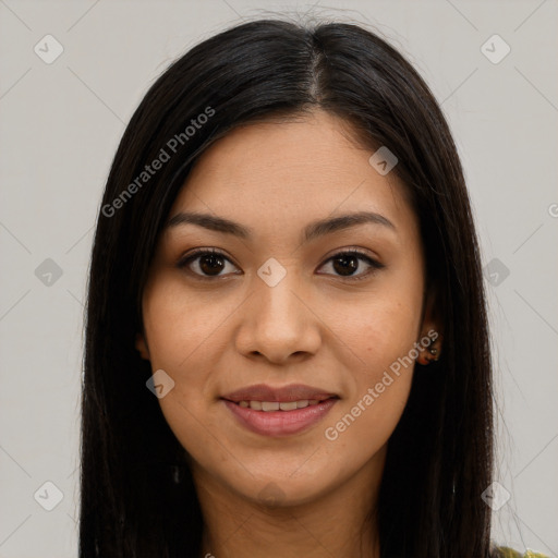 Joyful latino young-adult female with long  brown hair and brown eyes