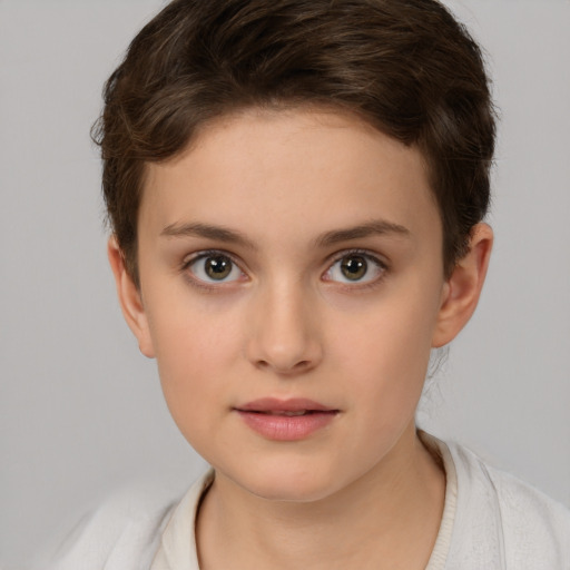 Joyful white child female with short  brown hair and brown eyes