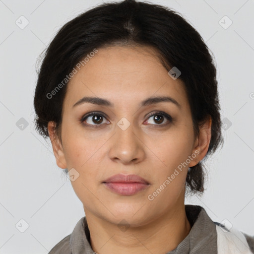 Joyful latino young-adult female with medium  brown hair and brown eyes