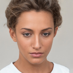 Neutral white young-adult female with short  brown hair and brown eyes