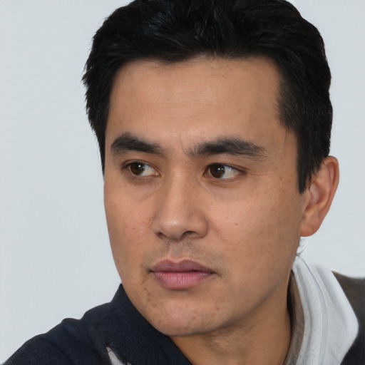 Neutral asian young-adult male with short  black hair and brown eyes