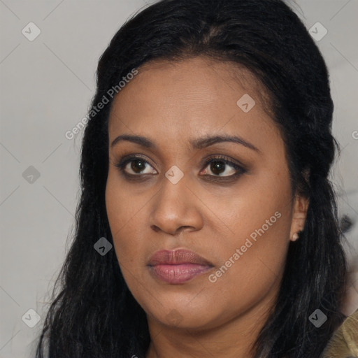 Joyful asian young-adult female with long  black hair and brown eyes