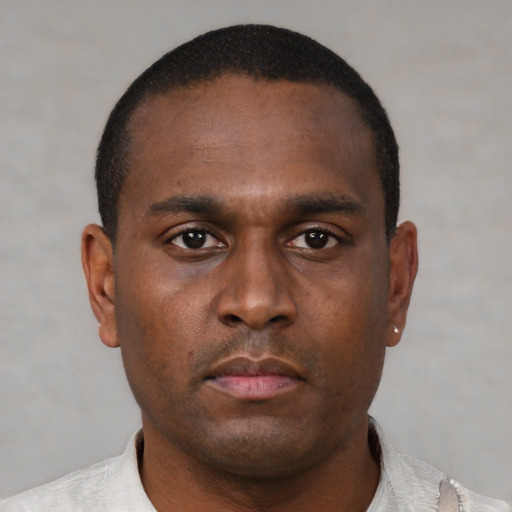 Neutral black young-adult male with short  brown hair and brown eyes