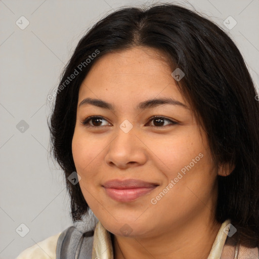 Joyful asian young-adult female with long  brown hair and brown eyes