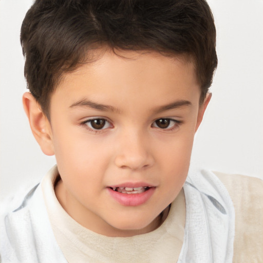 Joyful white child male with short  brown hair and brown eyes