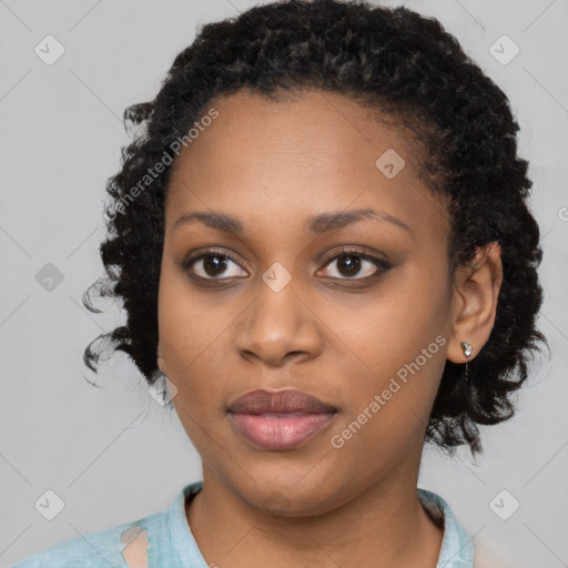 Joyful black young-adult female with medium  black hair and brown eyes