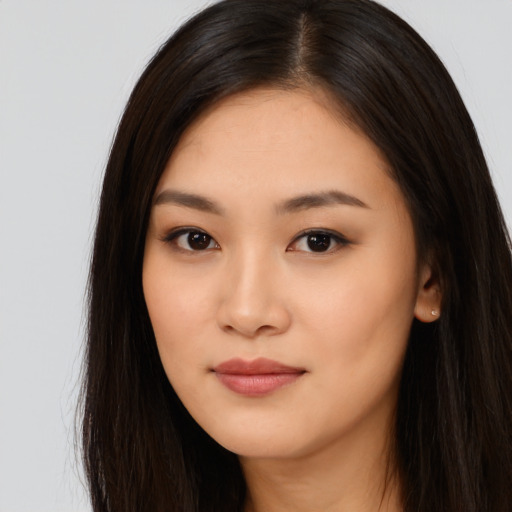 Neutral asian young-adult female with long  brown hair and brown eyes
