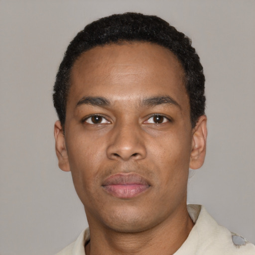 Neutral black young-adult male with short  black hair and brown eyes