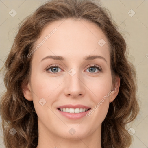 Joyful white young-adult female with long  brown hair and green eyes