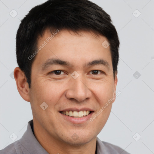 Joyful white adult male with short  brown hair and brown eyes