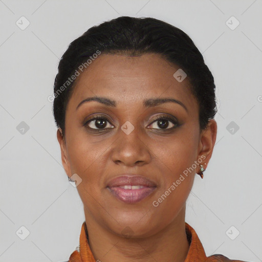 Joyful black young-adult female with short  brown hair and brown eyes