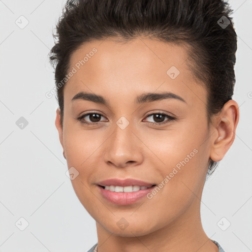 Joyful white young-adult female with short  brown hair and brown eyes