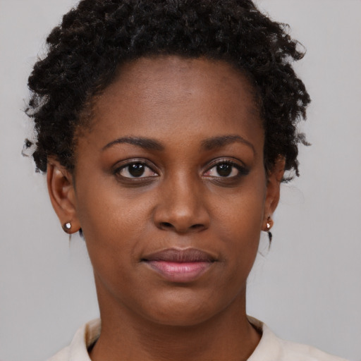 Neutral black young-adult female with short  brown hair and brown eyes