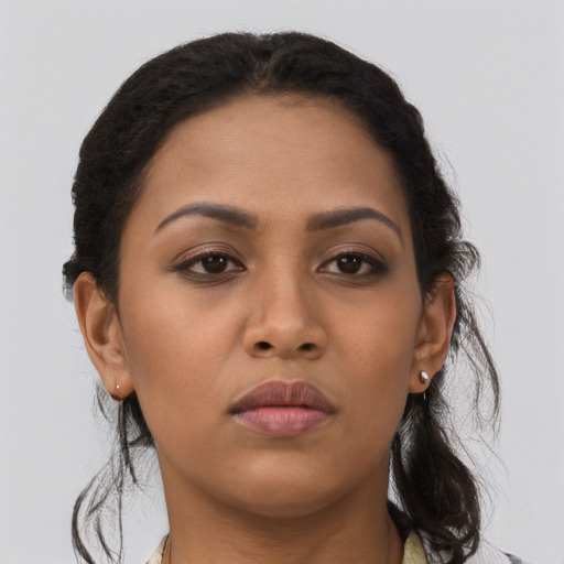 Neutral latino young-adult female with long  brown hair and brown eyes