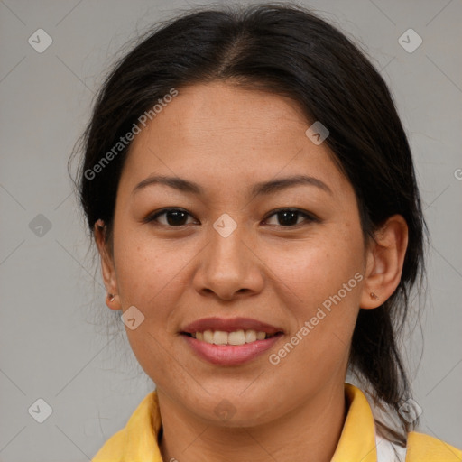 Joyful latino young-adult female with medium  brown hair and brown eyes