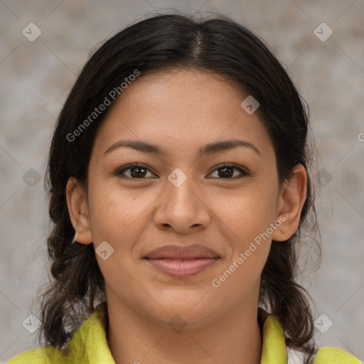 Joyful latino young-adult female with medium  brown hair and brown eyes