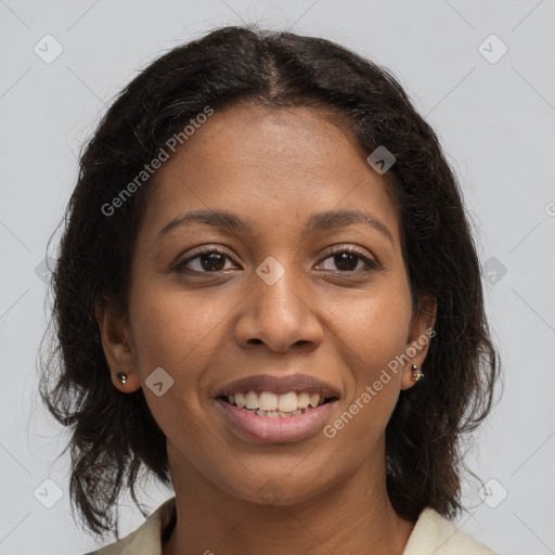 Joyful black young-adult female with medium  brown hair and brown eyes