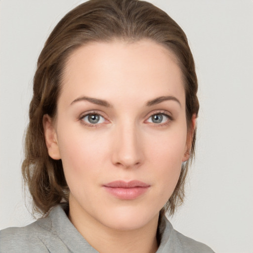 Neutral white young-adult female with medium  brown hair and grey eyes