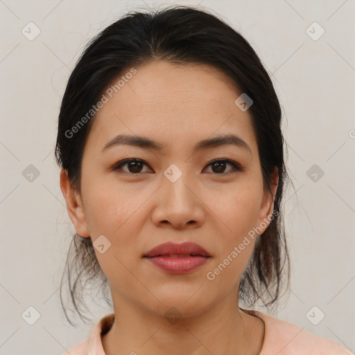 Joyful asian young-adult female with medium  brown hair and brown eyes