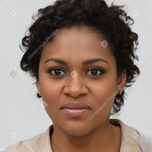 Joyful black young-adult female with medium  black hair and brown eyes