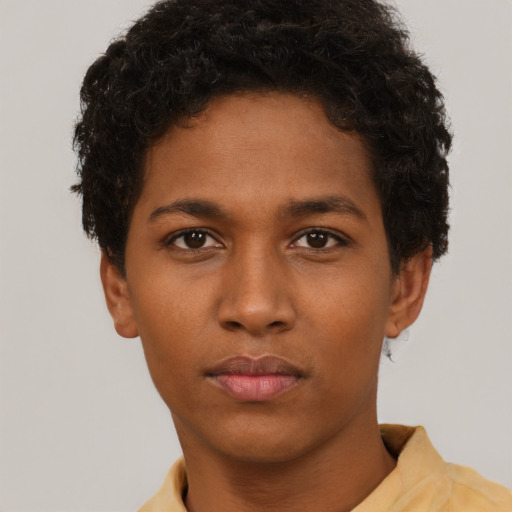 Neutral black young-adult female with short  brown hair and brown eyes