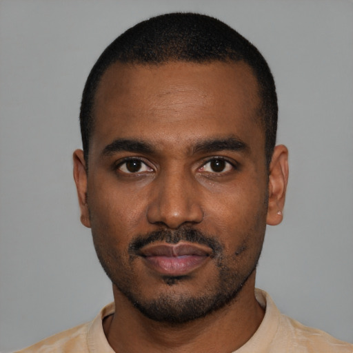 Neutral black young-adult male with short  black hair and brown eyes