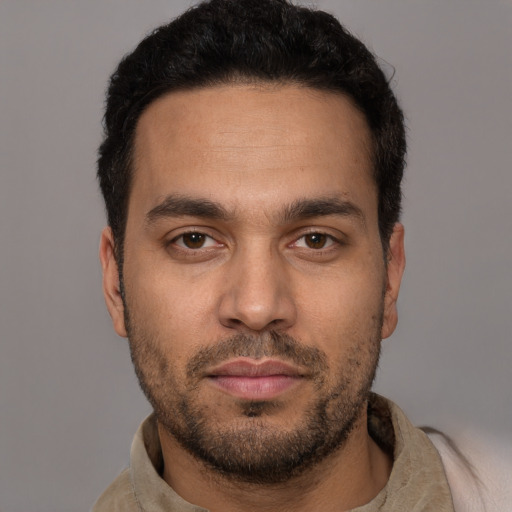 Neutral white young-adult male with short  black hair and brown eyes