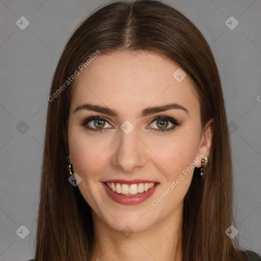 Joyful white young-adult female with long  brown hair and green eyes