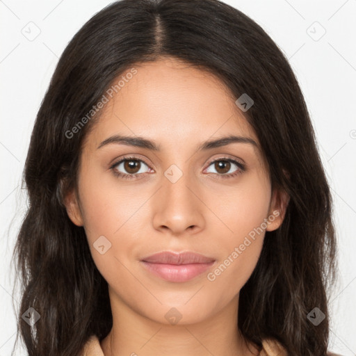 Joyful latino young-adult female with long  brown hair and brown eyes