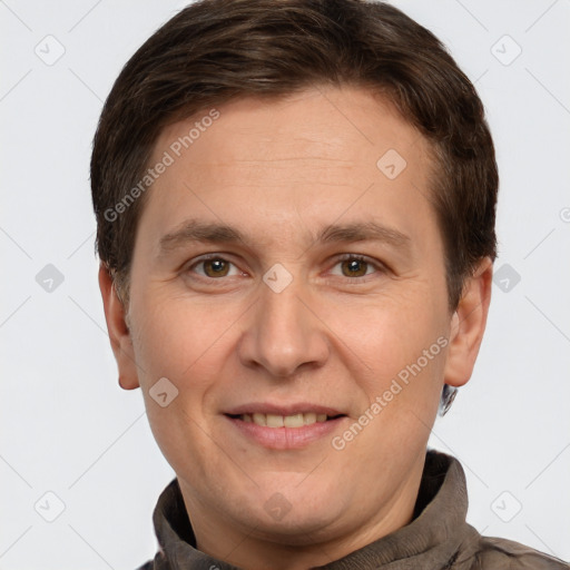 Joyful white adult male with short  brown hair and brown eyes