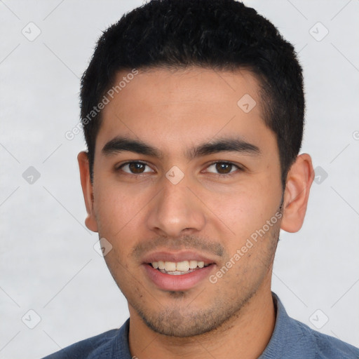 Joyful latino young-adult male with short  black hair and brown eyes