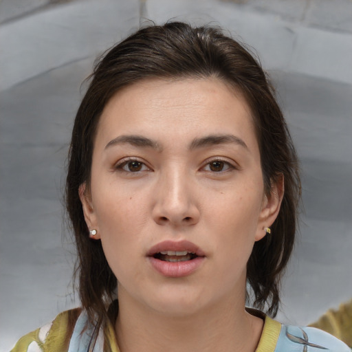 Neutral white young-adult female with medium  brown hair and brown eyes