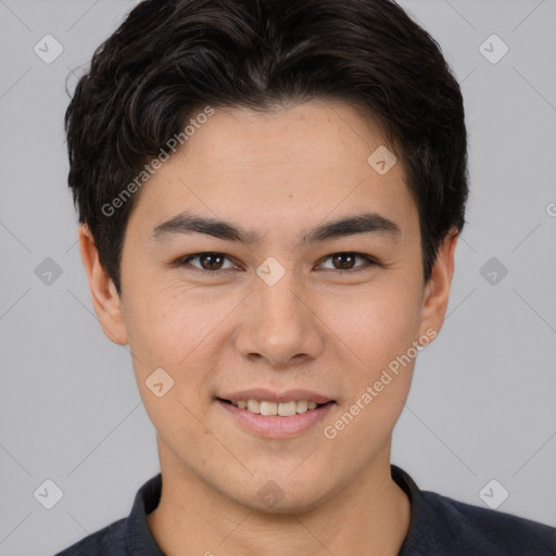 Joyful asian young-adult male with short  brown hair and brown eyes