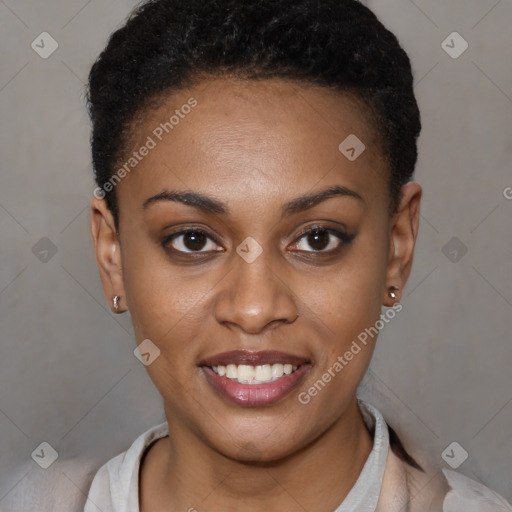 Joyful black young-adult female with short  black hair and brown eyes