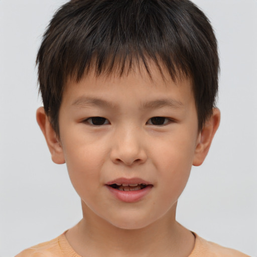 Joyful white child male with short  brown hair and brown eyes