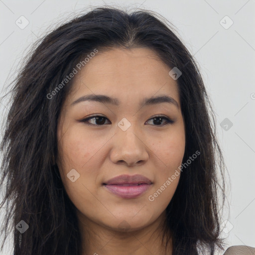 Joyful asian young-adult female with long  brown hair and brown eyes