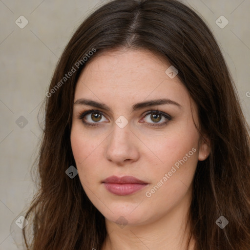 Neutral white young-adult female with long  brown hair and brown eyes