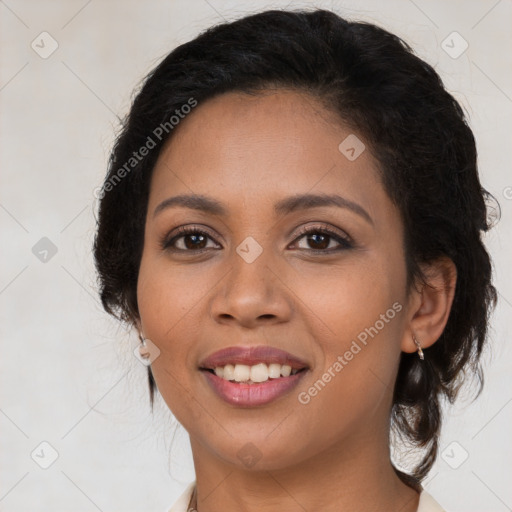 Joyful latino young-adult female with medium  brown hair and brown eyes