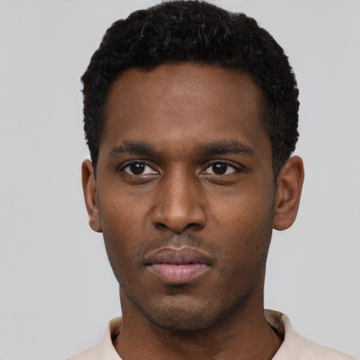 Neutral black young-adult male with short  black hair and brown eyes