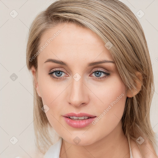 Joyful white young-adult female with long  brown hair and blue eyes