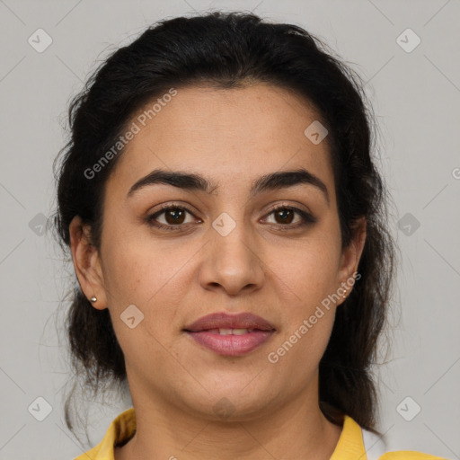 Joyful latino young-adult female with medium  brown hair and brown eyes