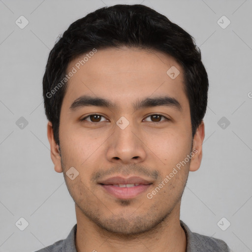 Joyful asian young-adult male with short  black hair and brown eyes